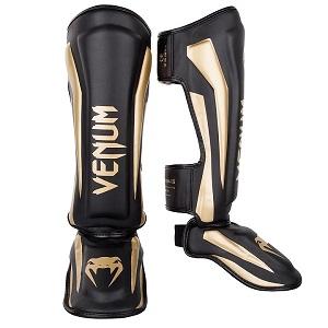 Venum - Espinilleras / Elite / Negro-Oro / Medium